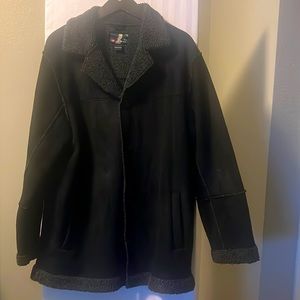 It’s a Black WHISPERING SMITH Coat In Good Condition with comfortable material